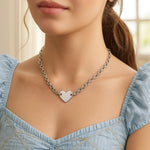 Sterling Silver Rhodium Plated Chain Bracelet with a Flat Heart Motif Station
