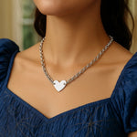 Sterling Silver Rhodium Plated Chain Bracelet with a Flat Heart Motif Station