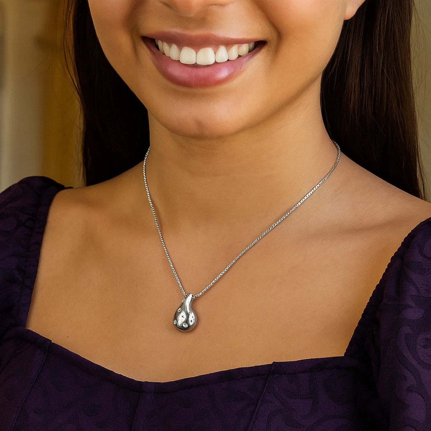 Sterling Silver Rhodium Plated Puffed Raindrop CZ Necklace