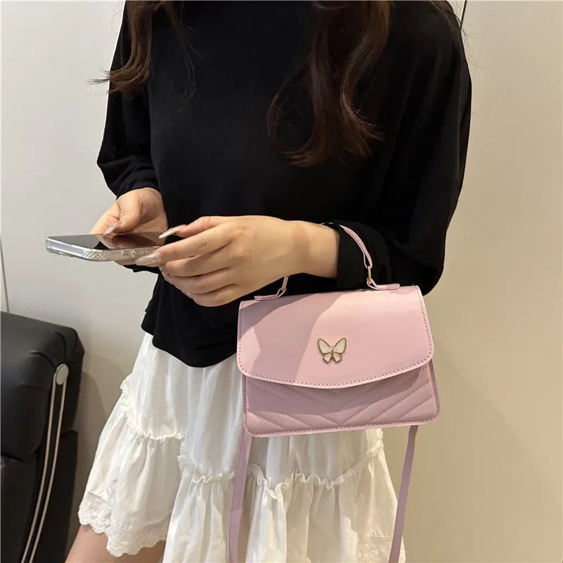 Lucky butterfly bag women's new fashion solid color simple texture trend.