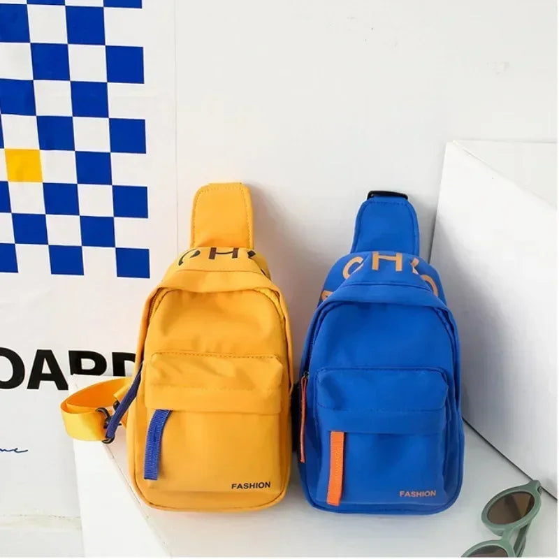 Cool kids bags for boys. Contrast color chest bag for little boys.