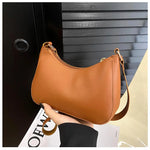 Fashionable and trendy solid-color handbag, simple and new small square bag.