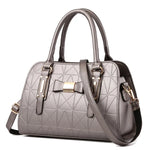 Large Capacity Butterfly Knot Women's Handbag Fashionable Embossed PU Leather.