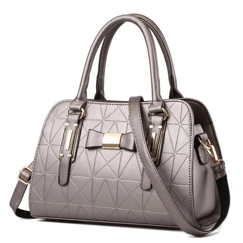 Large Capacity Butterfly Knot Women's Handbag Fashionable Embossed PU Leather.