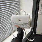 Lucky butterfly bag women's new fashion solid color simple texture trend.